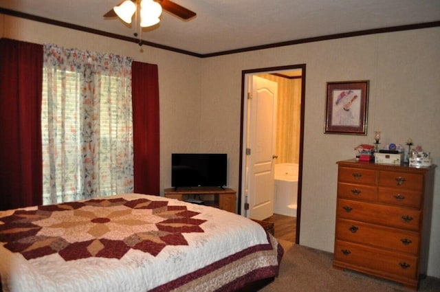 bedroom with connected bathroom, ceiling fan, and ornamental molding