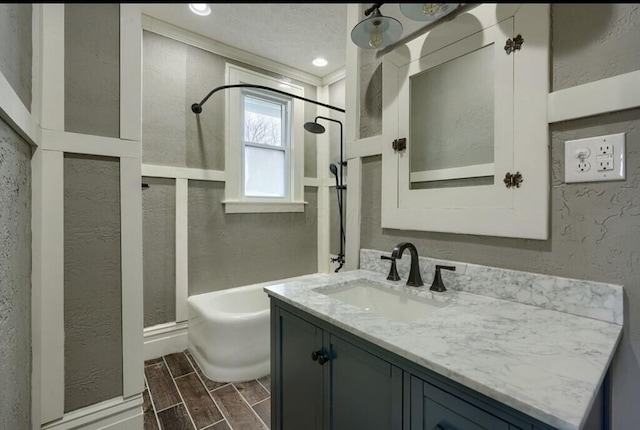 bathroom featuring vanity and shower / tub combination