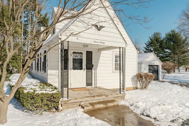 view of snow covered property entrance