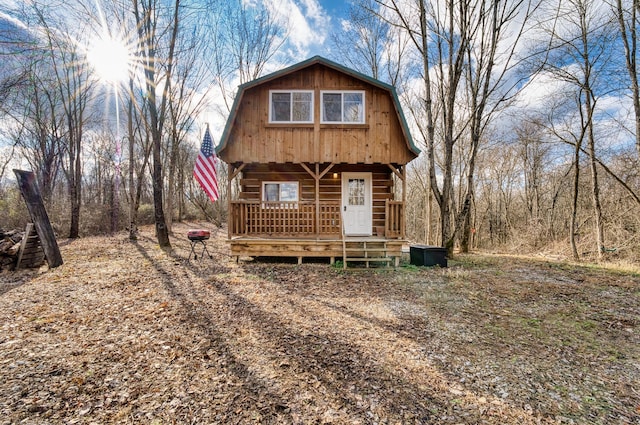 view of log cabin