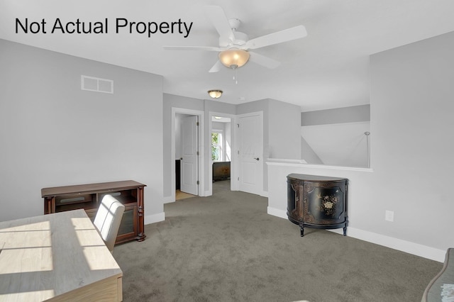 interior space featuring carpet flooring and ceiling fan