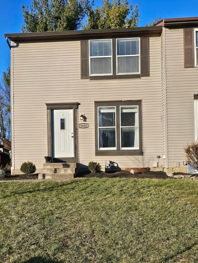 view of front of house with a front lawn