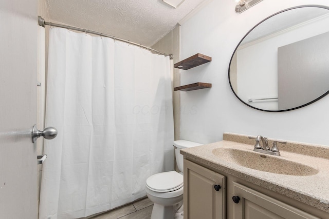 bathroom featuring vanity, a textured ceiling, toilet, and tile patterned flooring