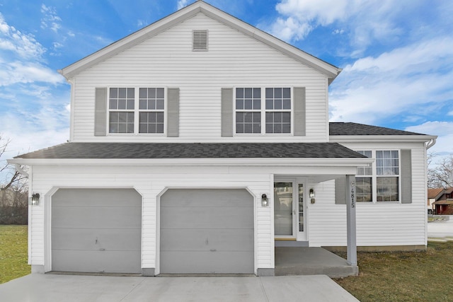 view of property featuring a garage