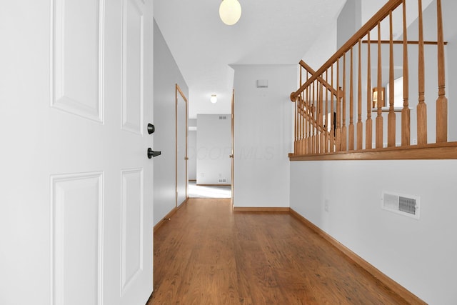 corridor featuring hardwood / wood-style flooring