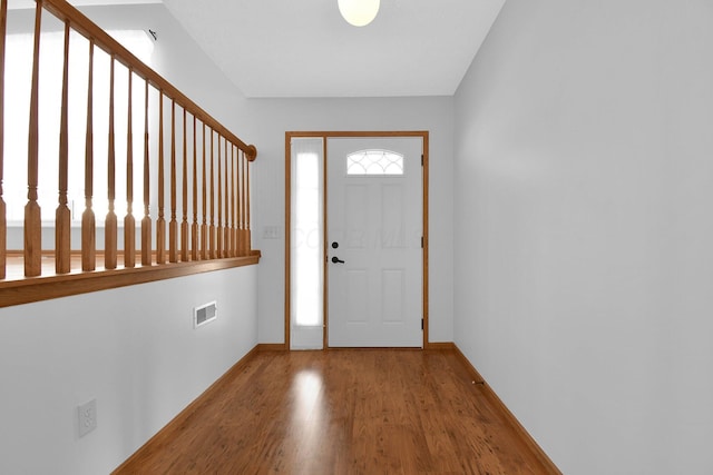 foyer featuring hardwood / wood-style floors