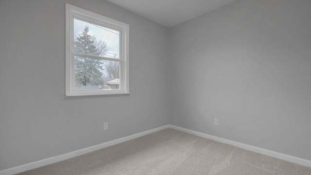 view of carpeted spare room