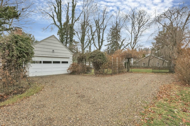 view of yard featuring a garage