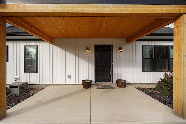 entrance to property with a patio area