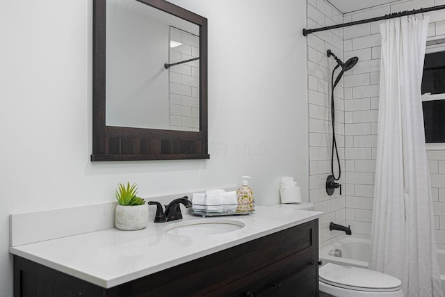 full bathroom with vanity, toilet, and shower / bathtub combination with curtain