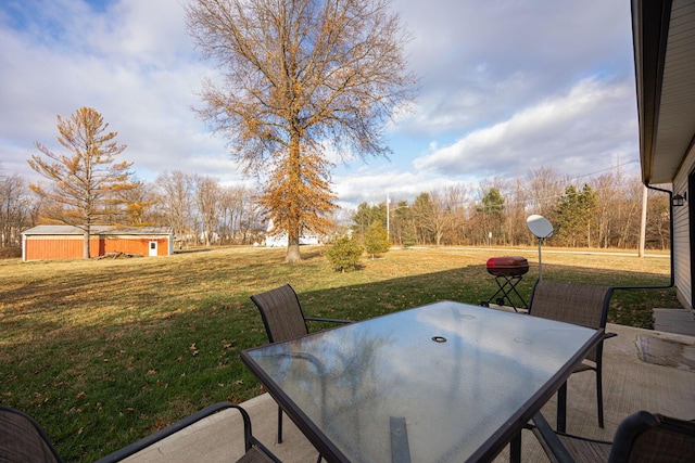 view of patio with a storage unit