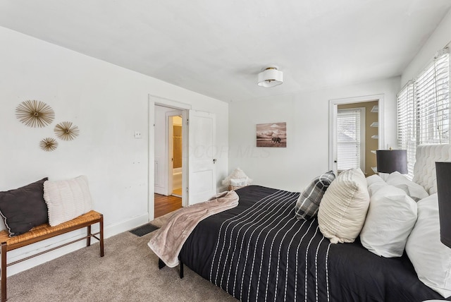 bedroom featuring carpet