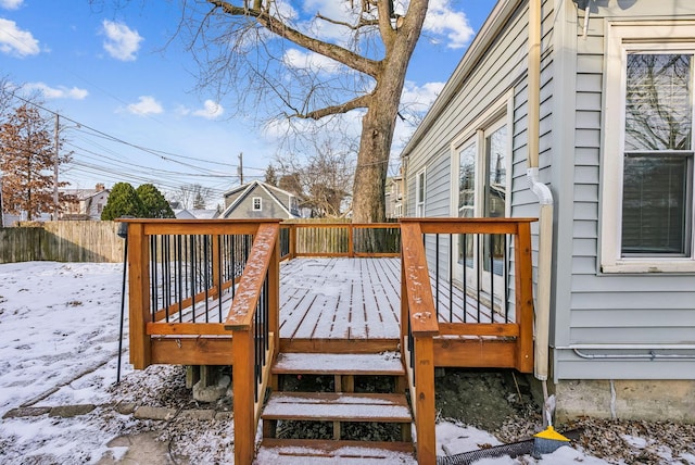 view of snow covered deck