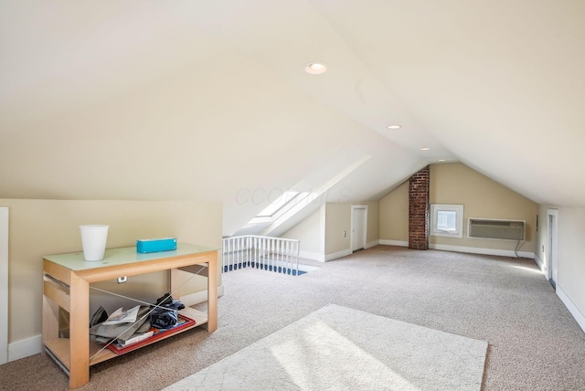 bonus room featuring lofted ceiling, carpet flooring, and a wall mounted AC