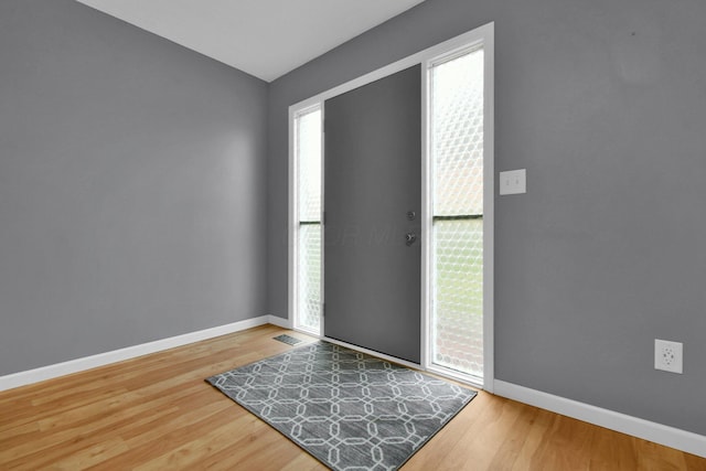 foyer entrance featuring hardwood / wood-style floors