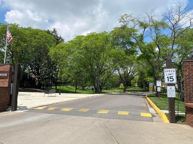 491 Clairbrook Ave Unit Jg3, Columbus, OH 43228 - view of asphalt street featuring traffic signs and curbs