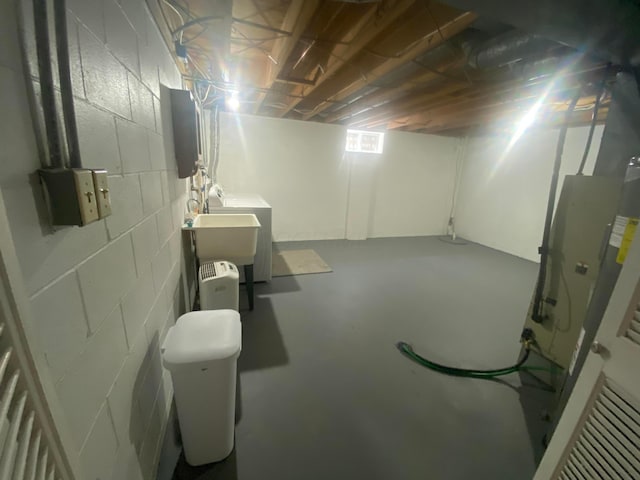 491 Clairbrook Ave Unit Jg3, Columbus, OH 43228 - basement featuring washer / dryer and concrete block wall