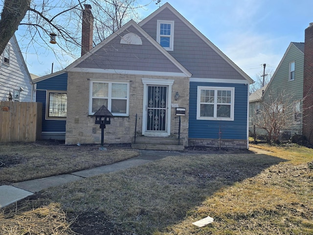 view of front of home featuring a front yard