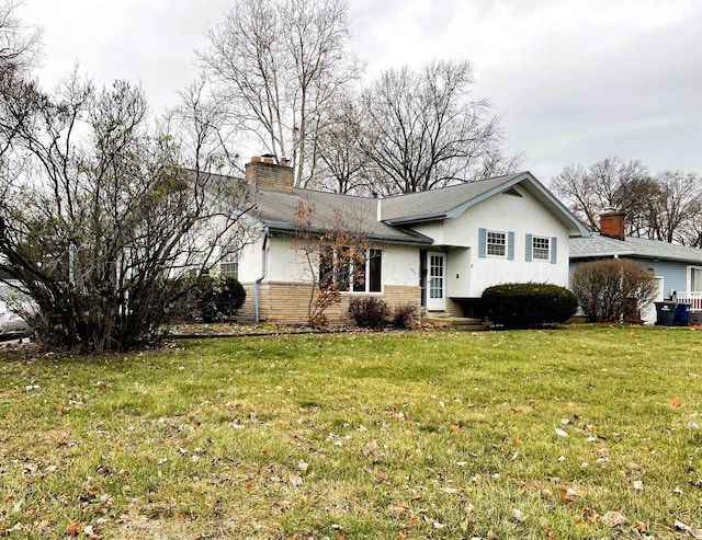 exterior space with a front yard