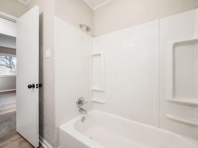 bathroom with  shower combination and hardwood / wood-style floors