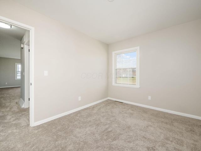 empty room with light carpet