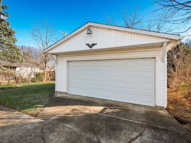 garage with a yard