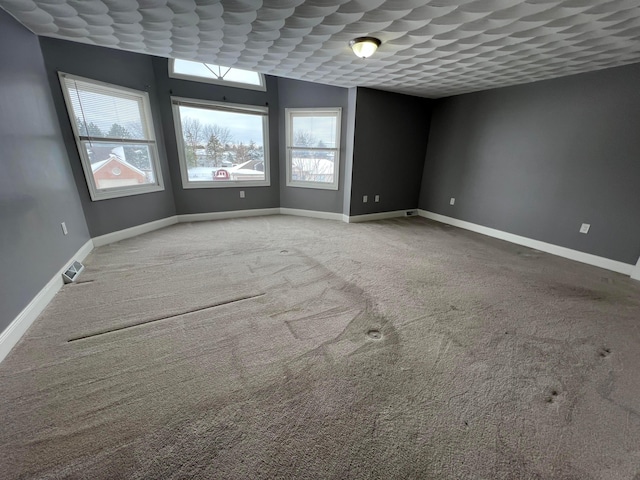 empty room featuring carpet