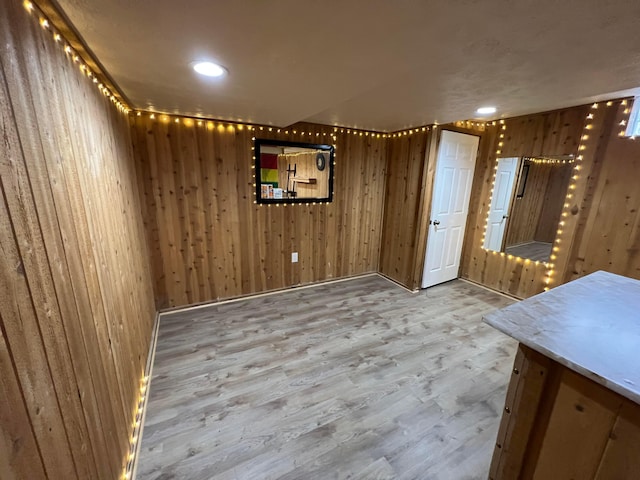 unfurnished dining area with light hardwood / wood-style floors