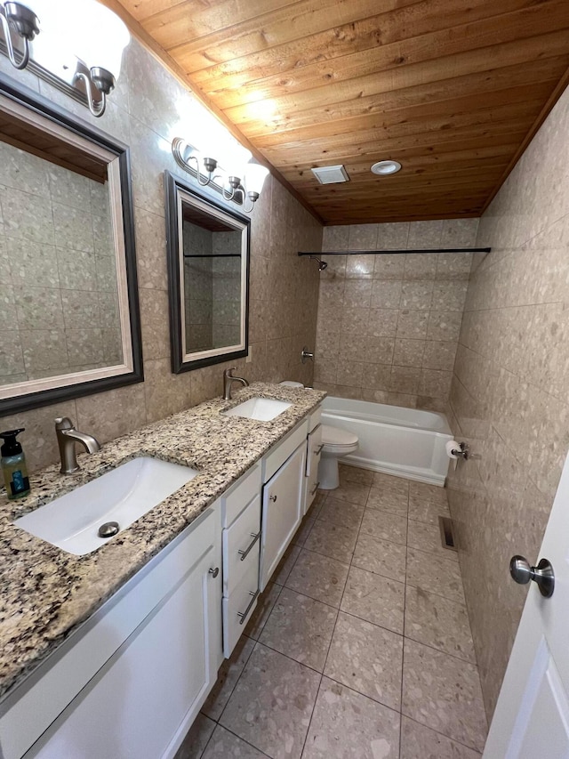 full bathroom with toilet, wooden ceiling, tile walls, and tiled shower / bath