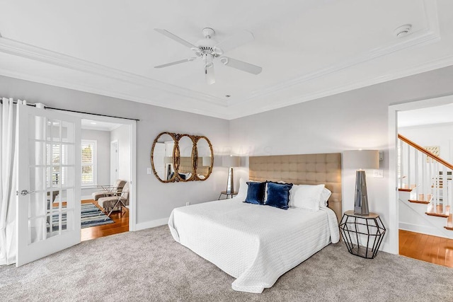 carpeted bedroom with ceiling fan and crown molding