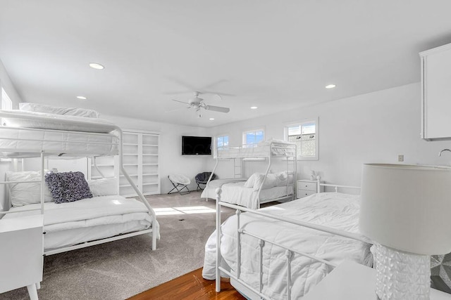 bedroom featuring ceiling fan and wood-type flooring