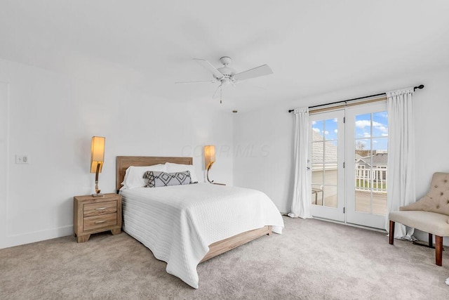 carpeted bedroom featuring access to exterior and ceiling fan