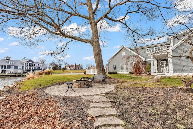 view of yard with a patio area and a fire pit