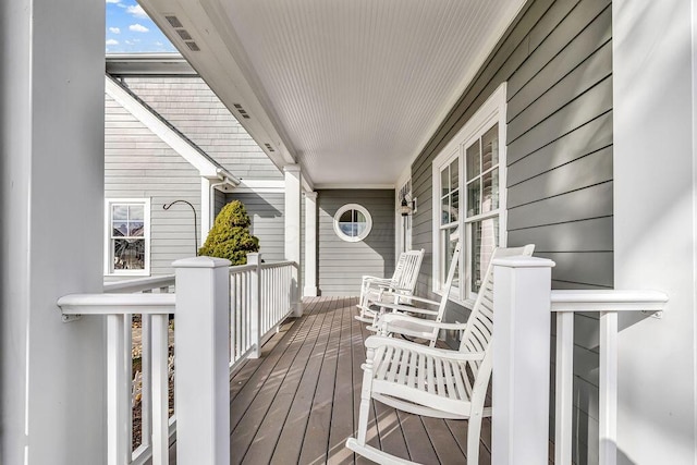 wooden deck featuring a porch