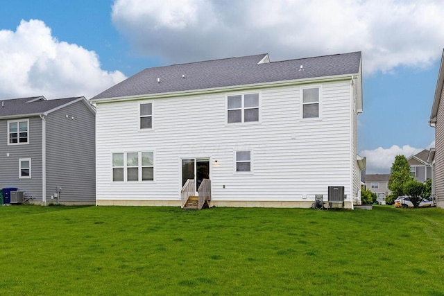 531 White Fawn Run, Delaware, OH 43015 - rear view of house with a lawn, cooling unit, and entry steps