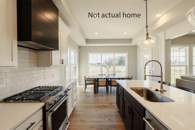 kitchen with appliances with stainless steel finishes and white cabinets