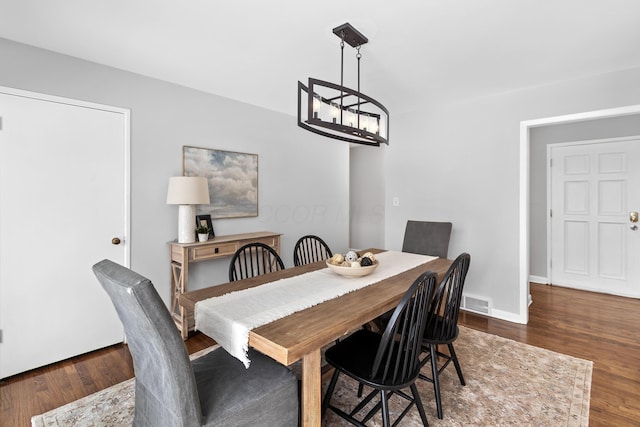 dining room featuring dark hardwood / wood-style floors