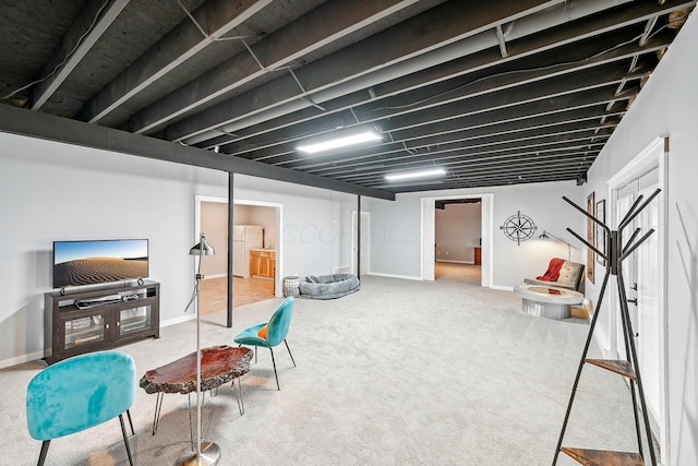 basement featuring carpet and white fridge