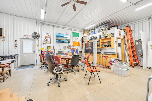 garage with ceiling fan and white fridge