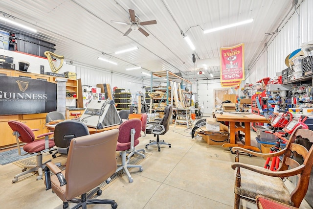 miscellaneous room featuring a workshop area and ceiling fan