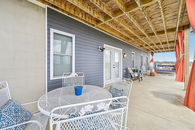 view of patio featuring french doors