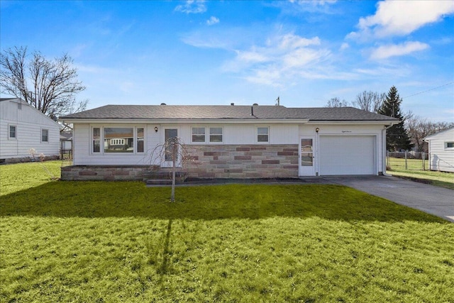 ranch-style house with a front lawn and a garage