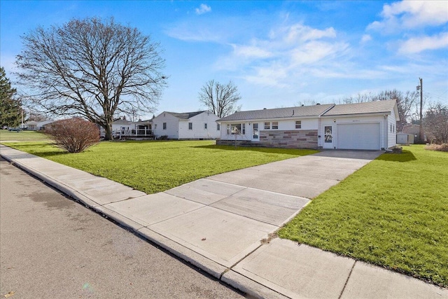 single story home featuring a front yard and a garage