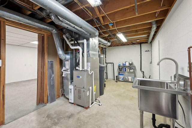 basement with sink and heating unit