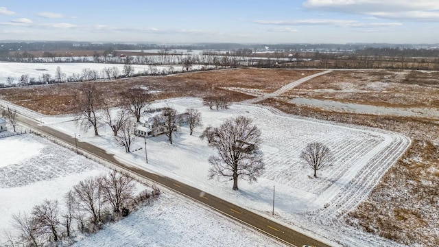 snowy aerial view with a rural view