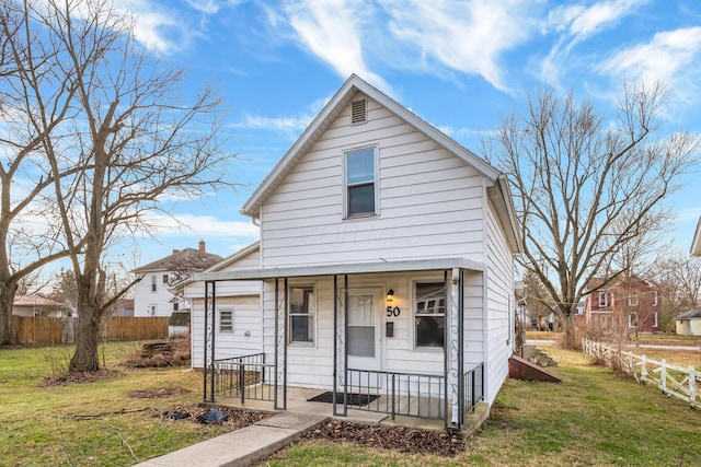 bungalow with a front yard