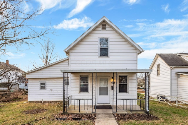 bungalow-style house featuring a front yard and a porch