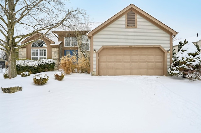 ranch-style house with a garage