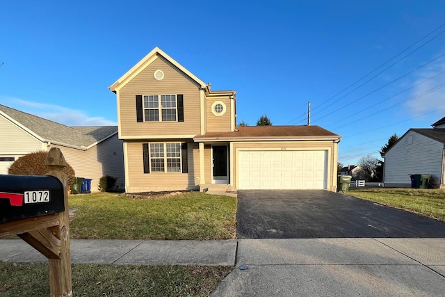 front of property with a garage and a front yard