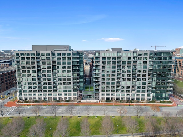 view of building exterior featuring a city view